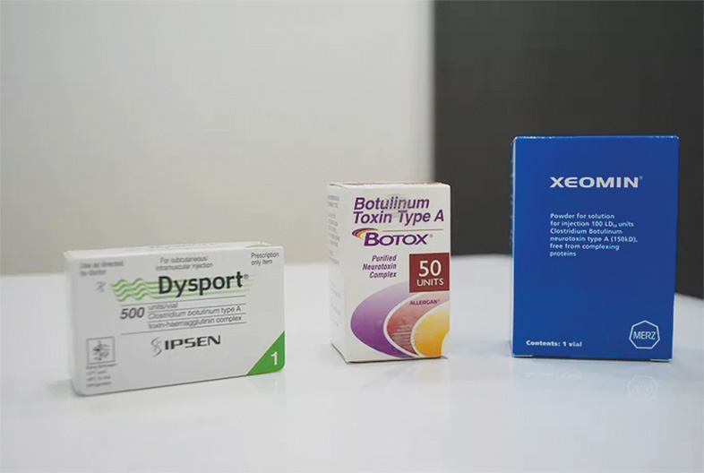 3 botox brands dysport, botox and xeomin boxes displayed on a white table