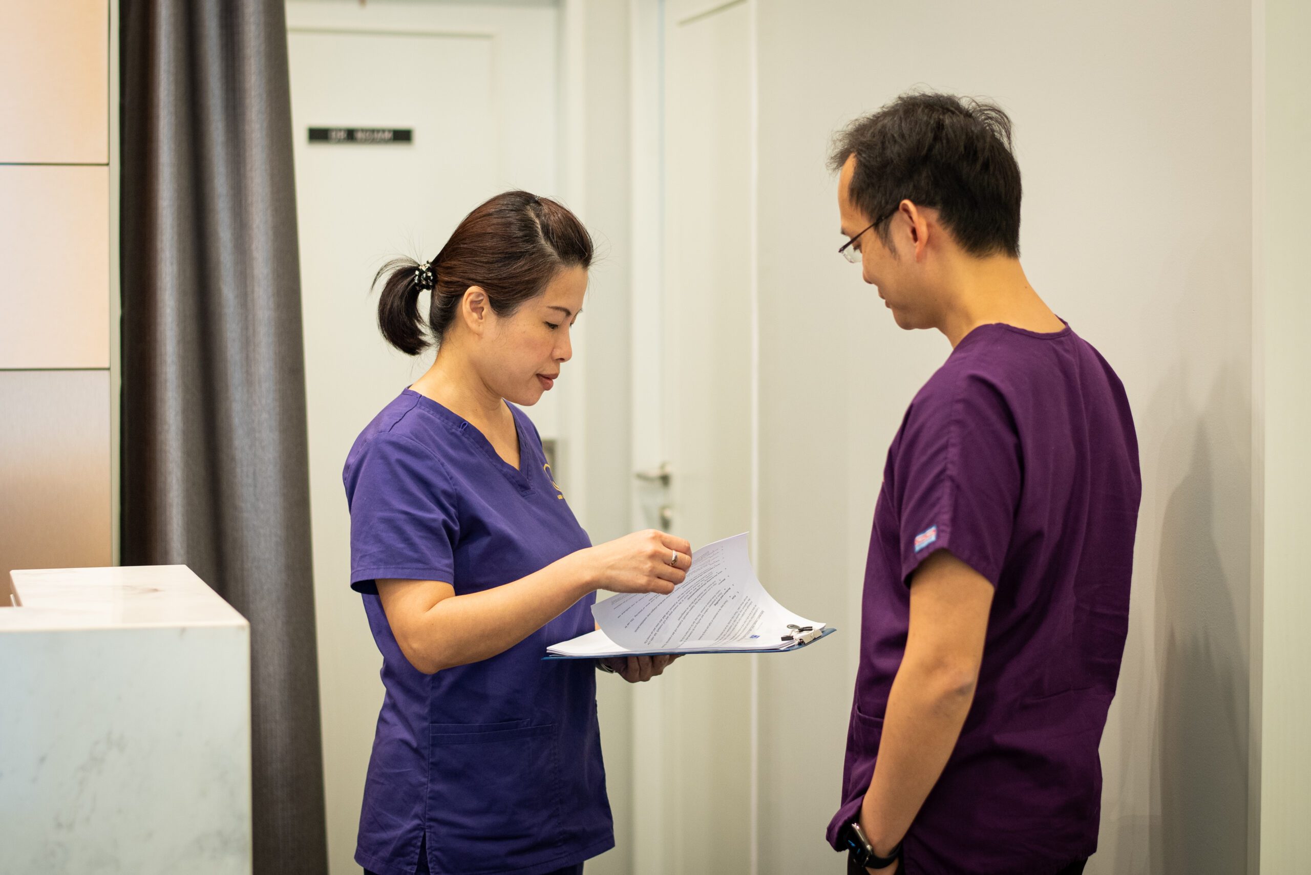 j laser clinic nurse with doctor for teleconsultation preparation